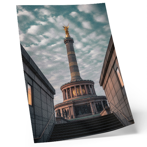 Art print An elegant column with an angel and modern architecture