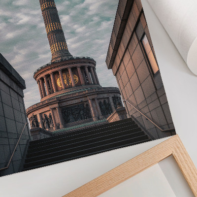 Art print An elegant column with an angel and modern architecture