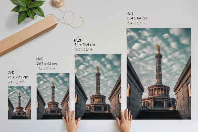 Art print An elegant column with an angel and modern architecture