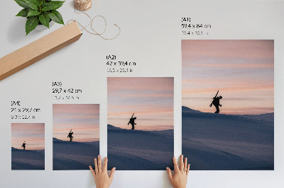 Art print Skier against a pink sky in a winter landscape