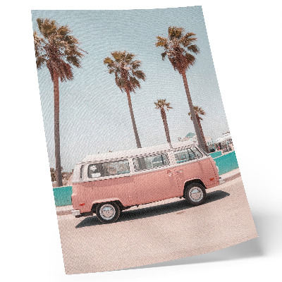 Premium wall art pink car under a blue sky with tall palm trees