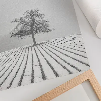 Poster minimalist winter landscape with a tree in the snow