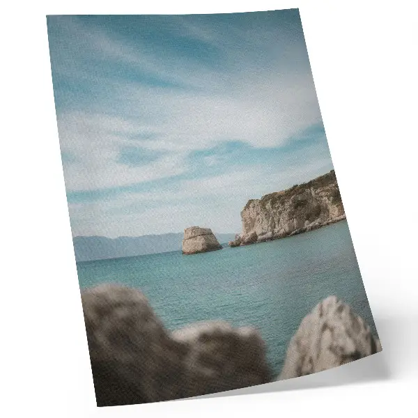 Poster cliffs by the sea under a blue sky