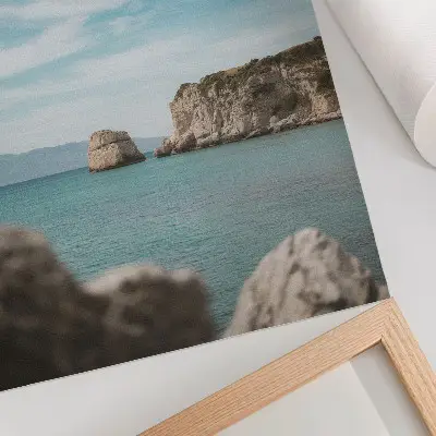 Poster cliffs by the sea under a blue sky