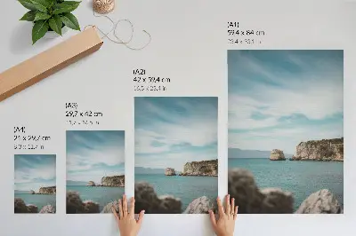Poster cliffs by the sea under a blue sky