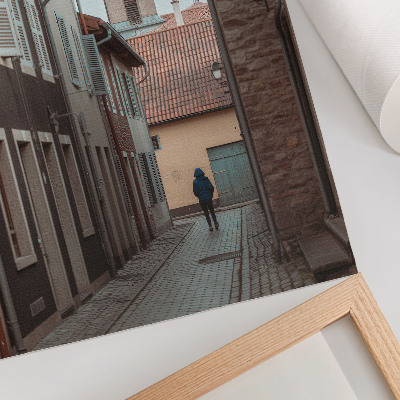 Poster Narrow street, tenement houses, tower, blue coat