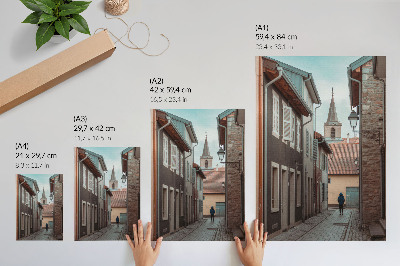 Poster Narrow street, tenement houses, tower, blue coat