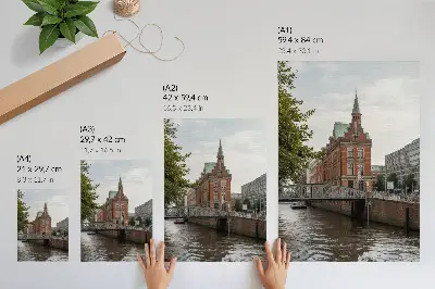 Art print historic building with a brick facade featuring a river bridge and turret