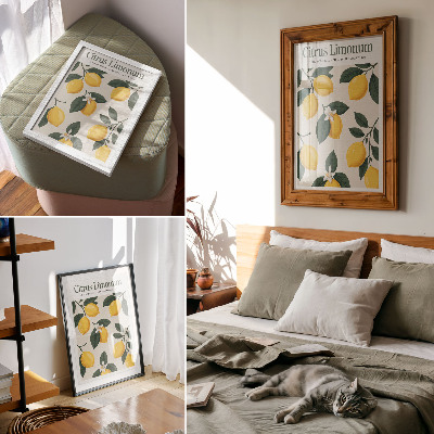 Poster Juicy lemons green leaves cream background