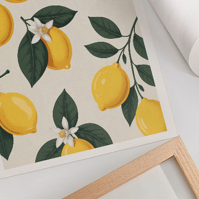 Poster Juicy lemons green leaves cream background