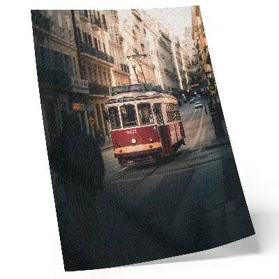 Decorative poster a tram passing through historic city architecture