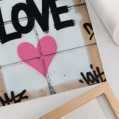 Premium wall art graffiti text heart on a concrete wall