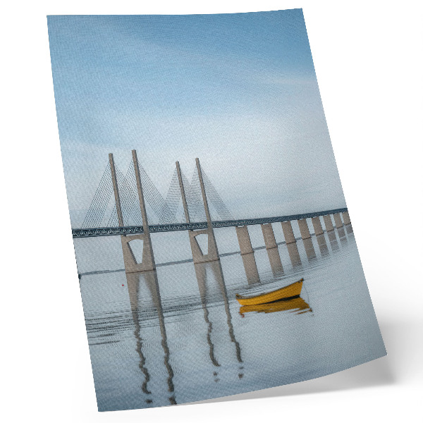Art print A bridge against the sky and water with a yellow boat
