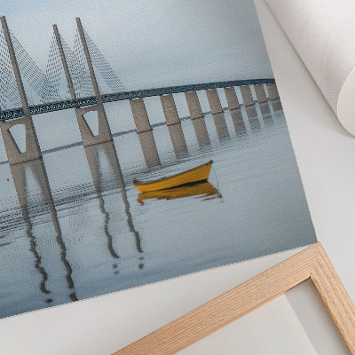 Art print A bridge against the sky and water with a yellow boat