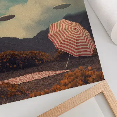 Art print featuring a picturesque landscape with an umbrella and mysterious objects