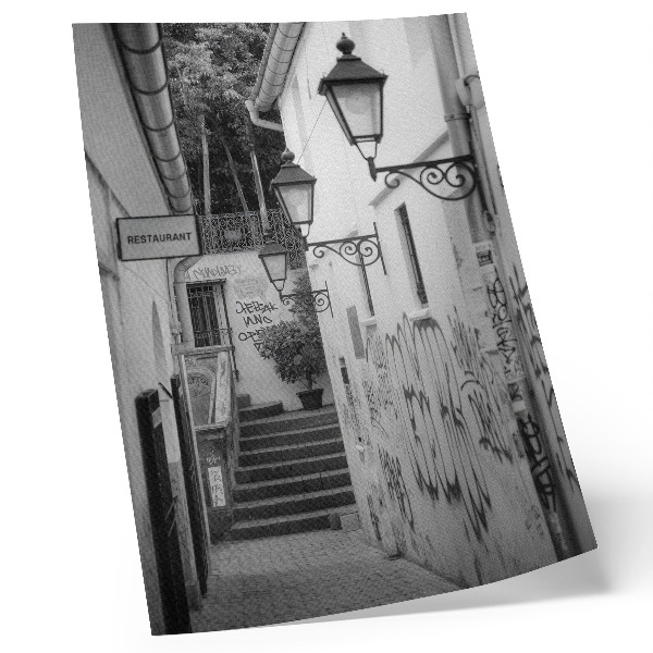 Premium wall art Black and white street with graffiti and street lamps
