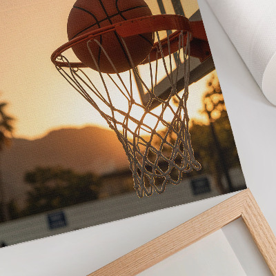 Poster Energetic sunset basketball ball