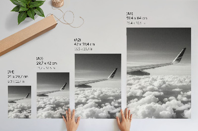 Decorative poster Airplane wing above the clouds black and white style