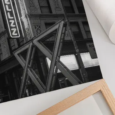 Black and white architectural wall art with neon hotel lights