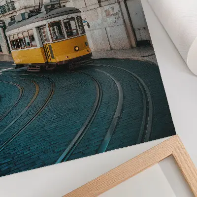 Art print a yellow tram on a city street curve