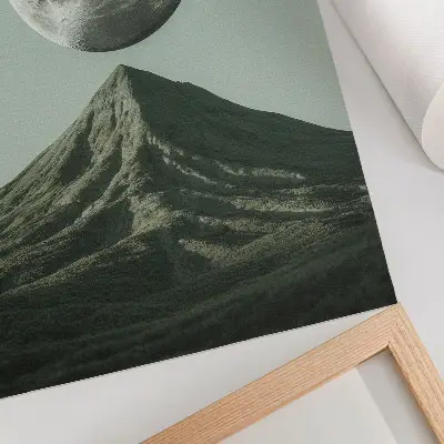 Poster featuring a mysterious moon over green mountain scenery