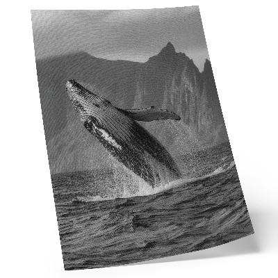 Premium wall art A photo of a jumping whale with mountains in the background.