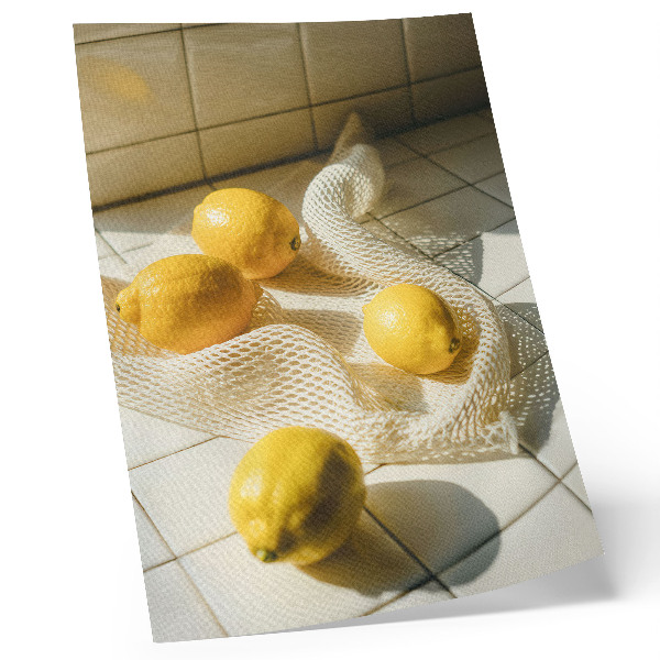Poster Lemons on a wire mesh in a kitchen setting