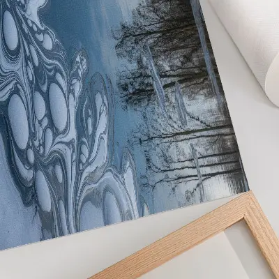 Decorative canvas print ice on the lake with tree reflections in blue tones