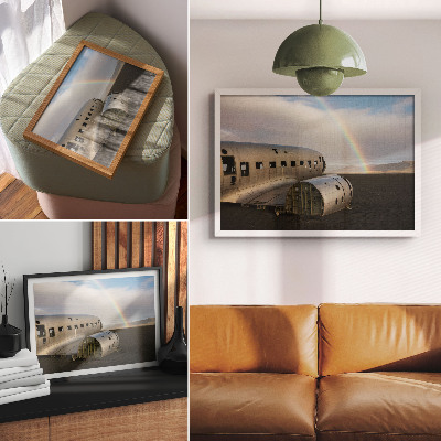 Decorative canvas print A metal plane wreck with a rainbow in the background.