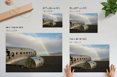 Decorative canvas print A metal plane wreck with a rainbow in the background.