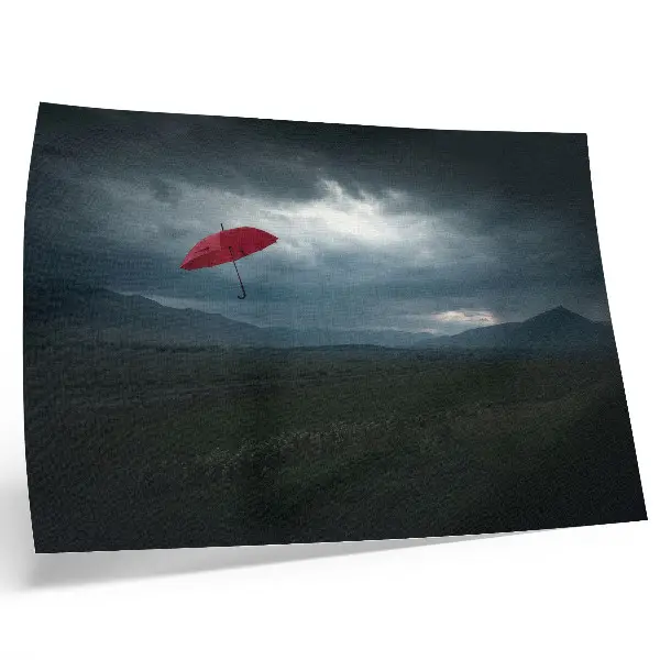 Photo canvas red umbrella under dark mountain clouds
