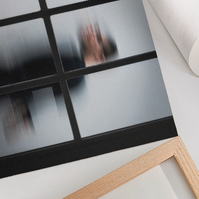 Decorative canvas print Black silhouette behind a glass frame, gray minimalism