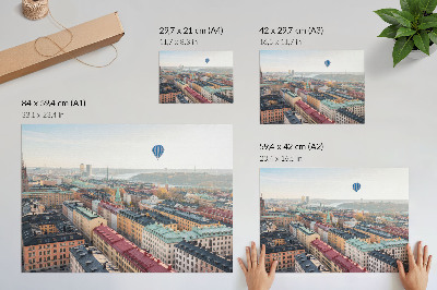 Photo canvas Colorful city balloon over buildings sky