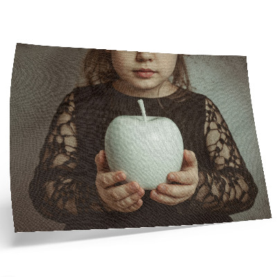 Decorative canvas print Girl with white fruit mysterious atmosphere