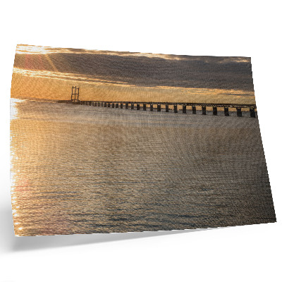 Poster A bridge on the horizon lit by the sun