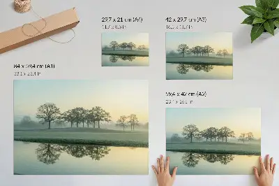 Photo canvas calm water surface with reflections of trees in soft fog