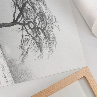 Decorative canvas print lonely tree in winter with a minimalist aesthetic