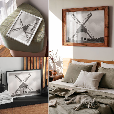Decorative canvas print A black and white windmill in a field with horses