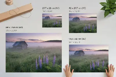 Decorative canvas print featuring a picturesque wooden cottage amidst foggy nature and flowers