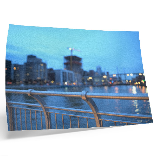 Decorative canvas print City waterfront in the evening with blurred lights