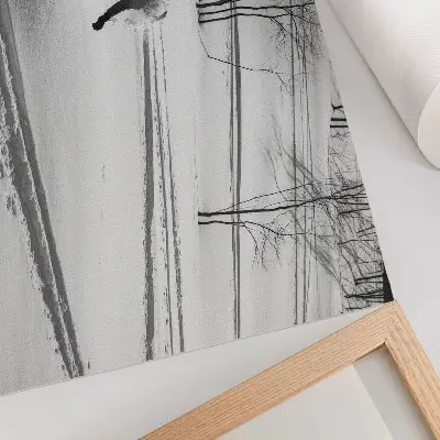 Poster snowboarder in action among snowy trees with high contrast
