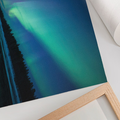 Photo canvas Aurora Borealis over a frozen lake at night