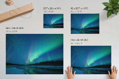 Photo canvas Aurora Borealis over a frozen lake at night