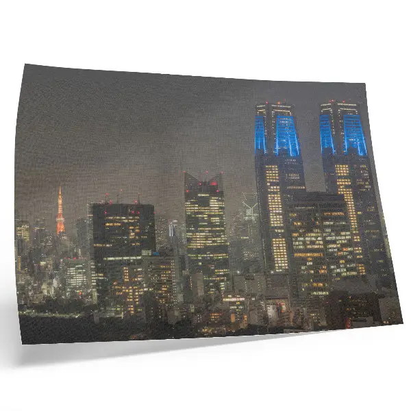 Decorative canvas print featuring illuminated skyscrapers in a modern city at night