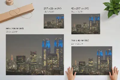 Decorative canvas print featuring illuminated skyscrapers in a modern city at night