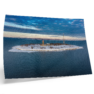 Photo canvas Winter island with a lighthouse and blue sea