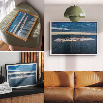Photo canvas Winter island with a lighthouse and blue sea