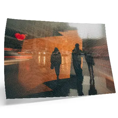 Photo canvas city in the evening with neon orange reflections