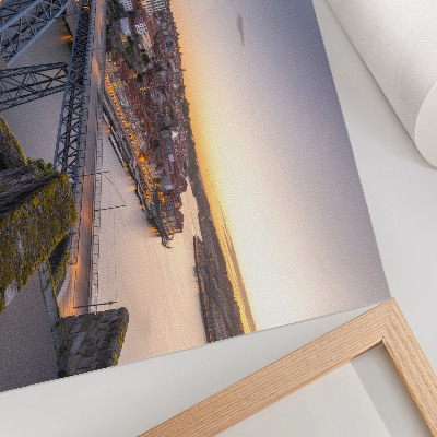 Decorative canvas print The bridge against the backdrop of the setting sun and the city