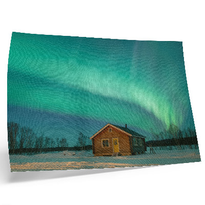 Decorative canvas print Northern Lights over the winter cottage